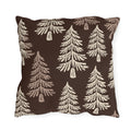 Cream fir trees on a dark chocolate outdoor pillow