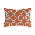 Terracotta Moroccan trellis outdoor lumbar pillow with a cream octagon lattice
