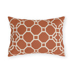 Terracotta Moroccan trellis outdoor lumbar pillow with a cream octagon lattice