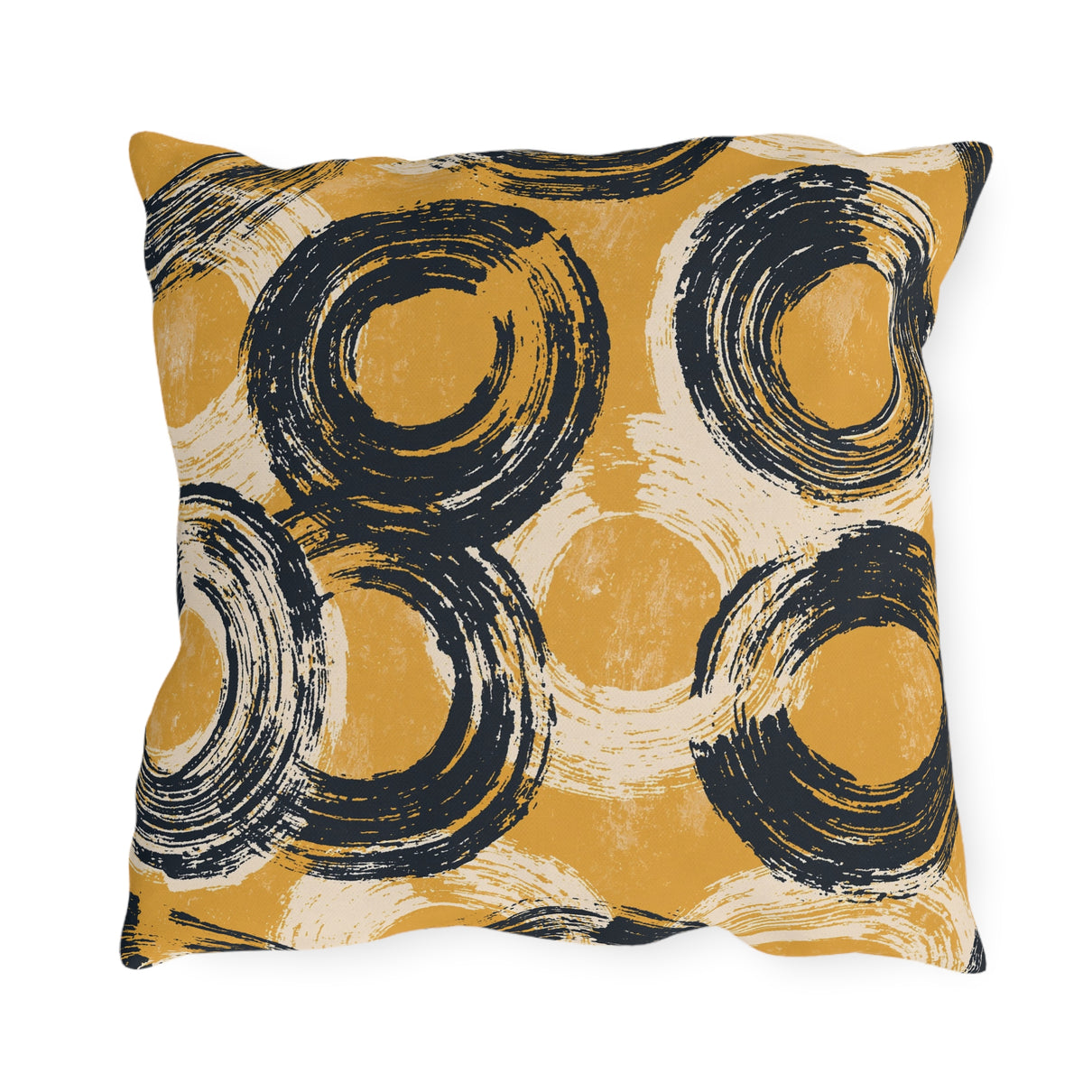 Navy brushed circles on a mustard yellow outdoor pillow