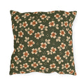 Cream blossoms with rust centres on a deep olive outdoor pillow, block print floral