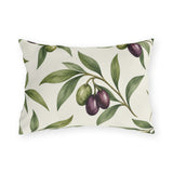 Green and purple olives on branches over a cream outdoor lumbar pillow
