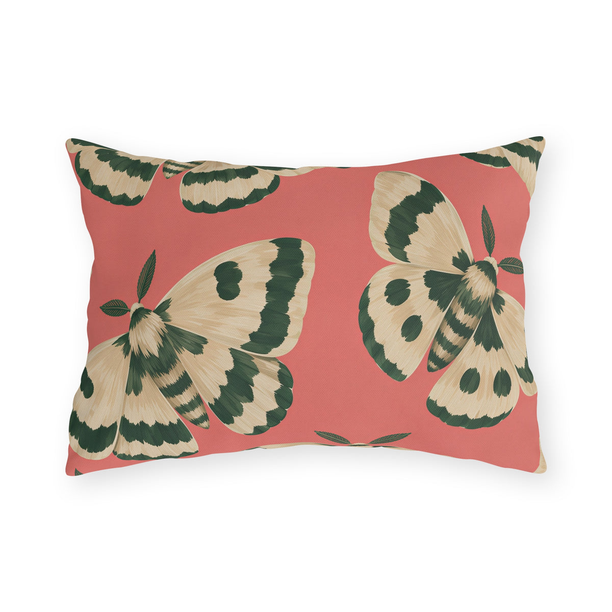 Pink outdoor lumbar pillow with large painted cream and forest green moths on coral pink