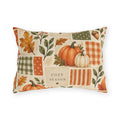 Watercolor pumpkin, acorn and autumn leaf patchwork outdoor lumbar pillow in orange and sage on cream