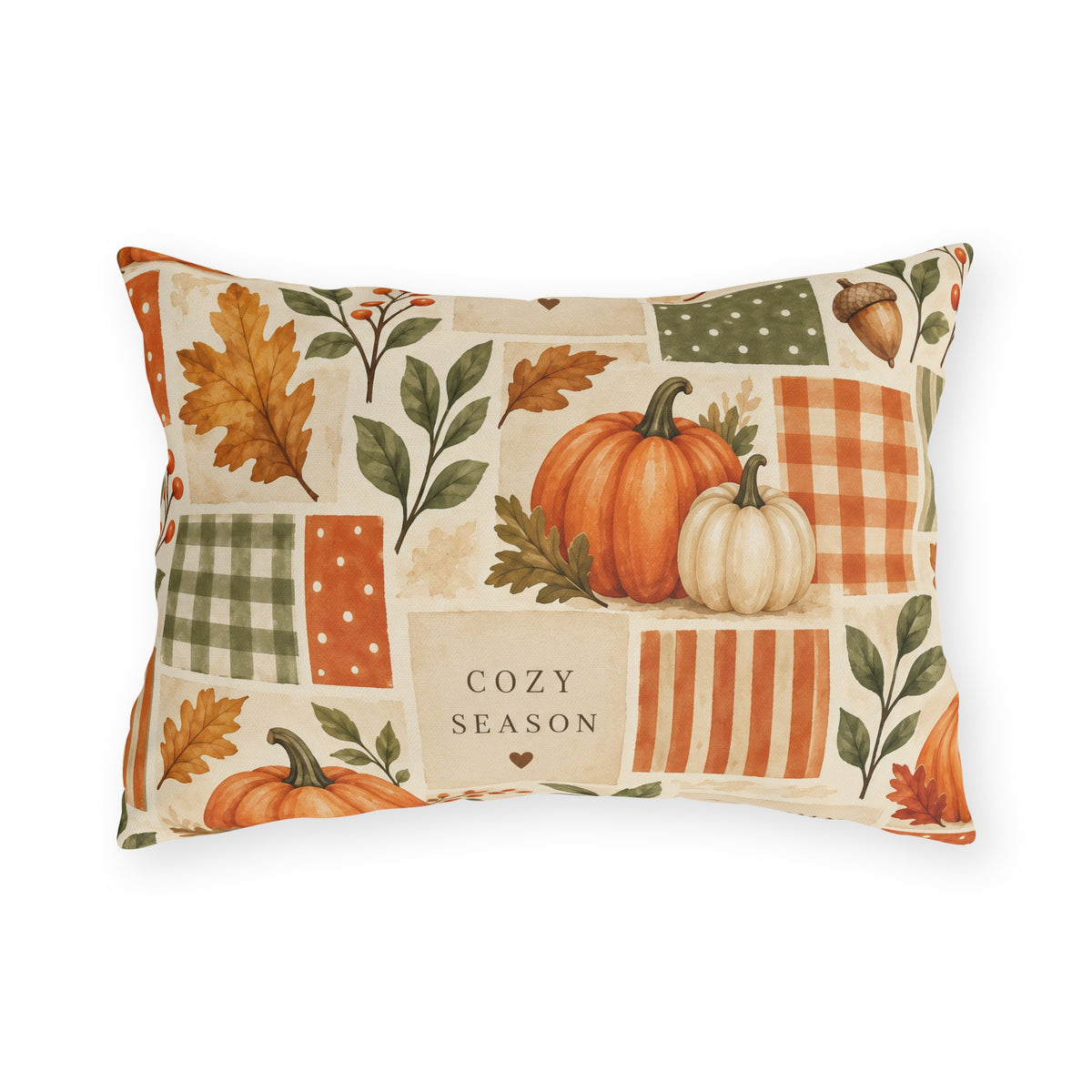 Watercolor pumpkin, acorn and autumn leaf patchwork outdoor lumbar pillow in orange and sage on cream