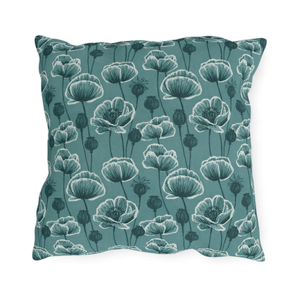 Teal and white poppies and seed heads on teal outdoor pillow