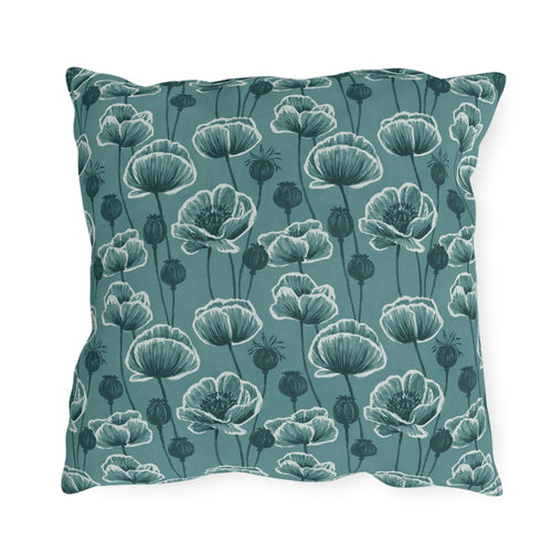 Teal and white poppies and seed heads on teal outdoor pillow