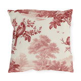 Red outdoor pillow with engraved country toile songbirds, blossoming branches, trees and a farmhouse on cream