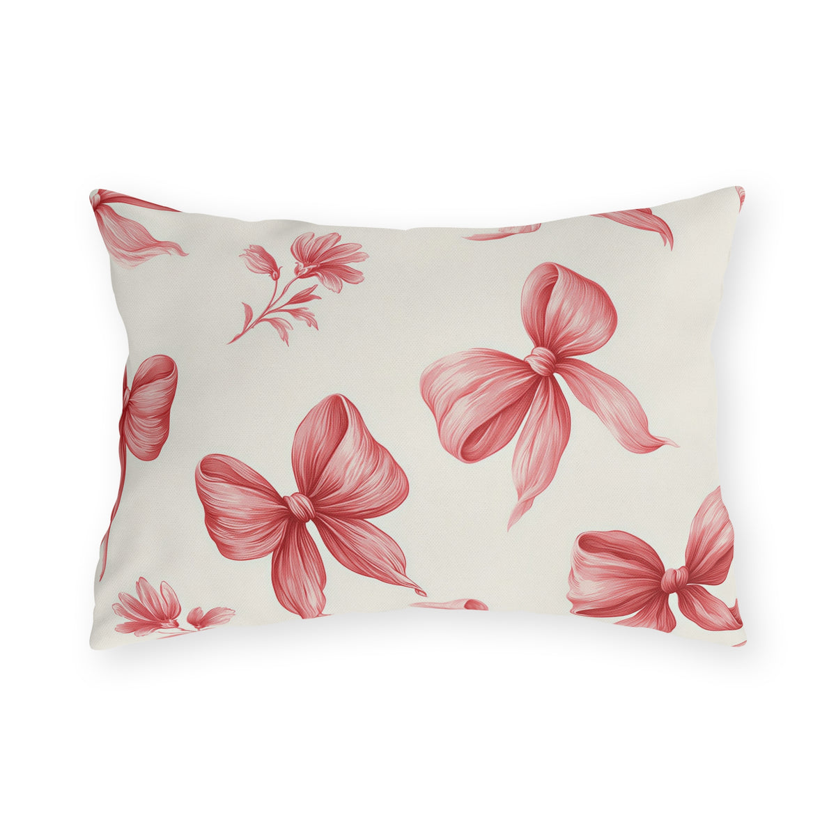 Pink outdoor lumbar pillow with hand-drawn rose pink ribbon bows and flower sprigs on cream