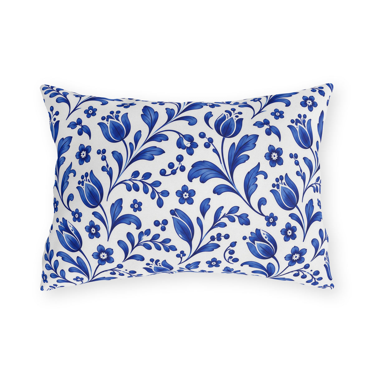 Scattered cobalt blue tulips and vines on a white outdoor lumbar pillow