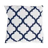 Navy and white quatrefoil outdoor pillow with a bold Moroccan trellis on crisp white