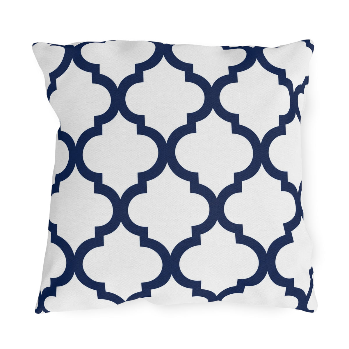Navy and white quatrefoil outdoor pillow with a bold Moroccan trellis on crisp white