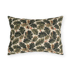 Deep green oak leaves and acorns on cream outdoor lumbar pillow