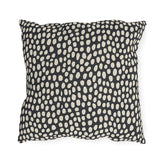 Hand-painted cream dots on charcoal outdoor pillow