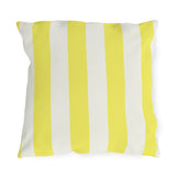 Bright yellow and cream cabana stripes on an outdoor pillow