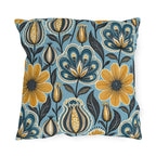 Floral outdoor pillow with Scandinavian folk flowers in mustard, teal and navy on sky blue