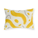 Modern yellow outdoor lumbar pillow with painted sunflower yellow waves and charcoal squiggles on cream