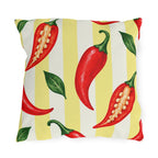 Watercolor red chili peppers and green leaves on a pale yellow and cream striped outdoor pillow
