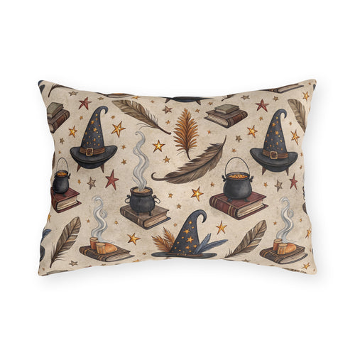 Witch hats, cauldrons, spell books and gold stars on parchment cream outdoor lumbar pillow