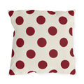 Merlot polka dot outdoor pillow with large deep wine purple dots on cream