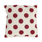 Merlot polka dot outdoor pillow with large deep wine purple dots on cream