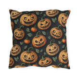 Carved jack-o-lantern pumpkins and vines on charcoal outdoor pillow