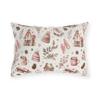 Pink cottages, wooden sleds, ice skates and bobble hats on cream outdoor lumbar pillow