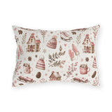 Pink cottages, wooden sleds, ice skates and bobble hats on cream outdoor lumbar pillow