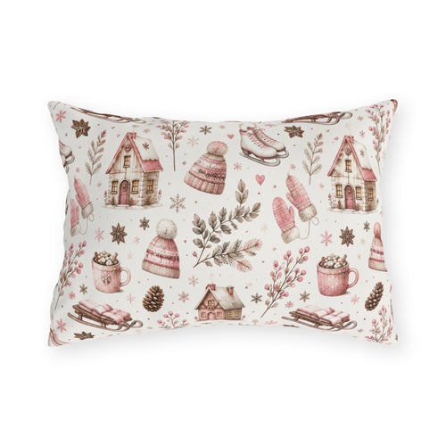 Pink cottages, wooden sleds, ice skates and bobble hats on cream outdoor lumbar pillow