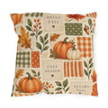 Watercolor pumpkin, acorn and autumn leaf patchwork outdoor pillow in orange and sage on cream