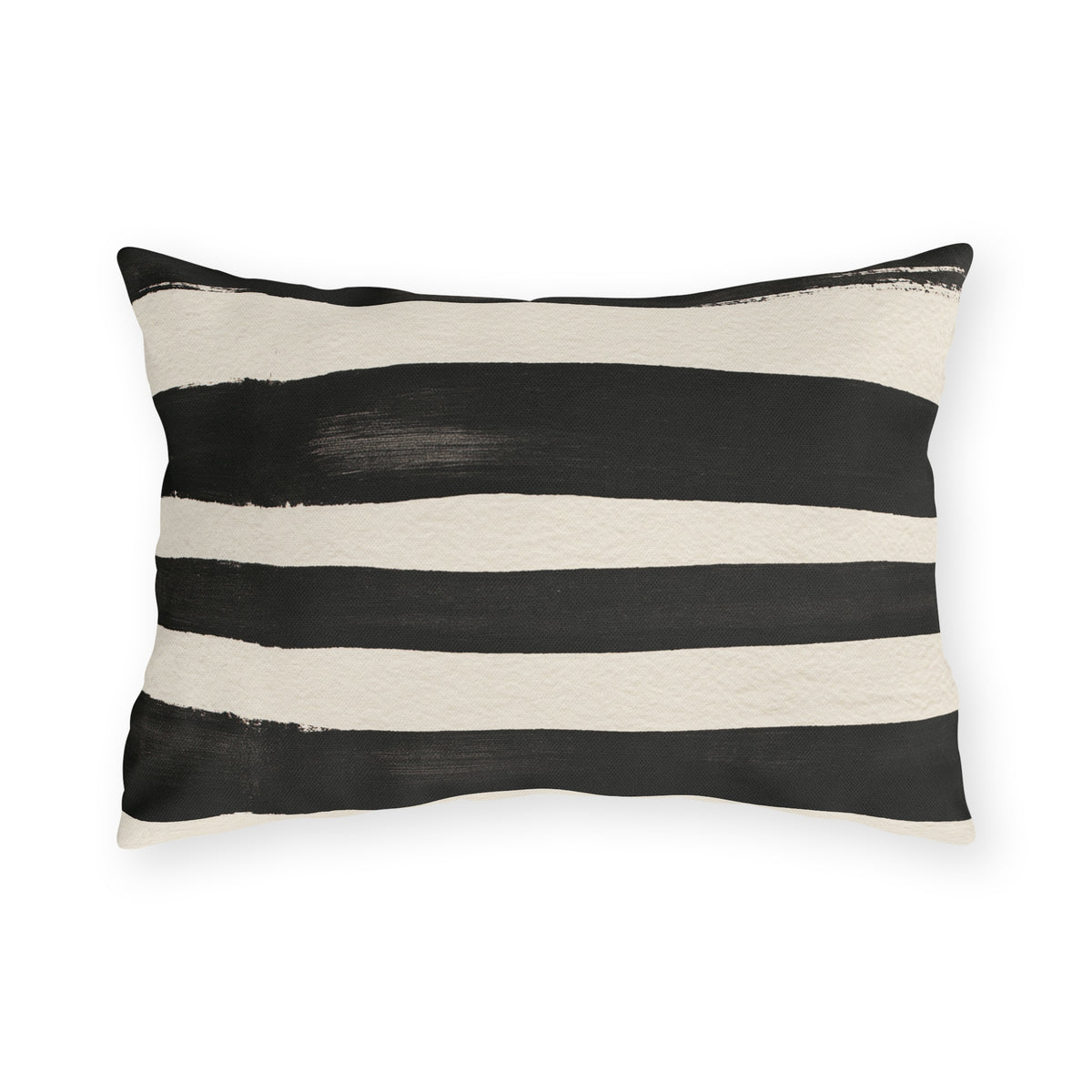 Wide black brushed stripes on a cream outdoor lumbar pillow