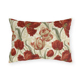 Deep red parrot tulips with sage leaves on a cream outdoor lumbar pillow