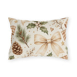 Christmas outdoor lumbar pillow with watercolor pinecones, holly with white berries, pine sprigs and ribbon bows on cream