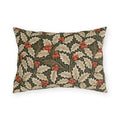 Ivory and olive holly leaves with coral berries on a deep green outdoor lumbar pillow
