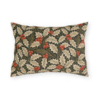 Ivory and olive holly leaves with coral berries on a deep green outdoor lumbar pillow