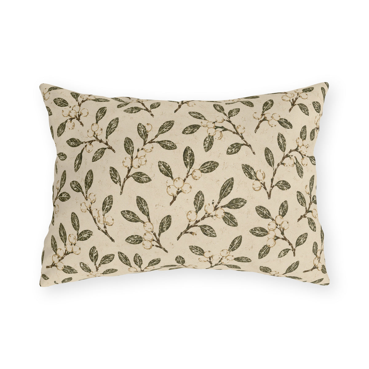 Olive leaves and pale snowberries block printed on a cream outdoor lumbar pillow