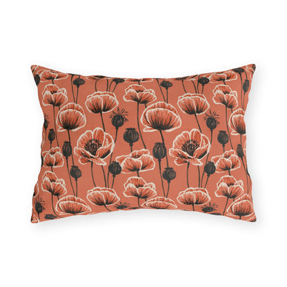 Coral poppies and black seed heads on terracotta outdoor lumbar pillow