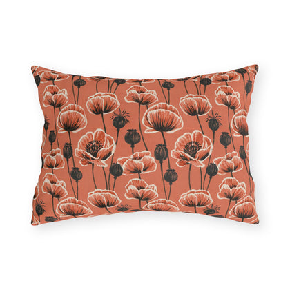Coral poppies and black seed heads on terracotta outdoor lumbar pillow
