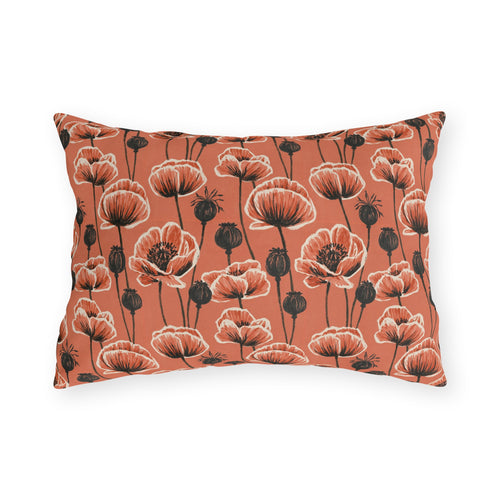 Coral poppies and black seed heads on terracotta outdoor lumbar pillow