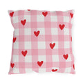 Light pink gingham outdoor pillow with small red hearts