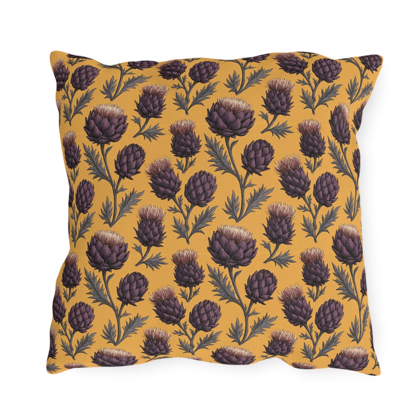 Deep plum artichoke thistles on warm ochre outdoor pillow