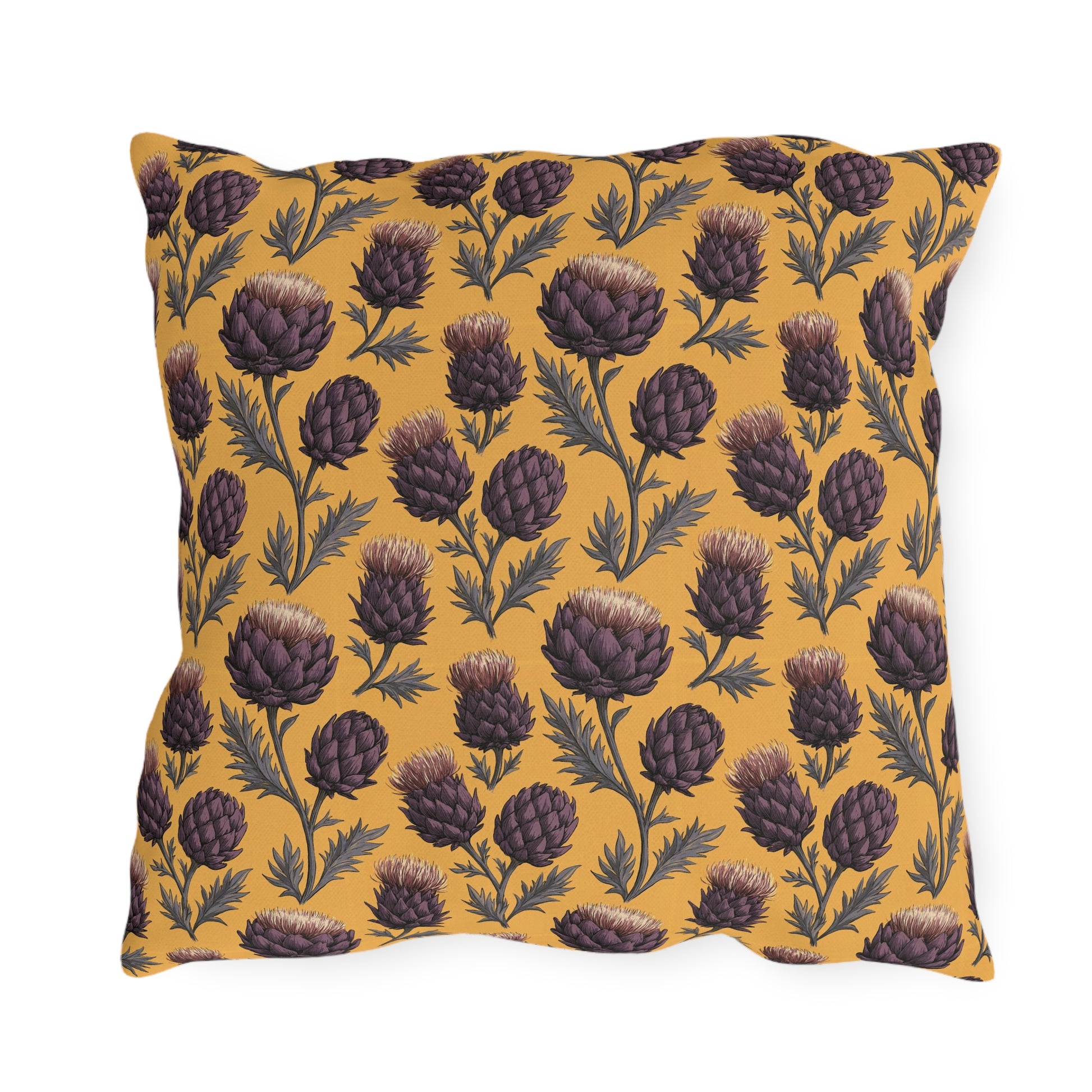 Deep plum artichoke thistles on warm ochre outdoor pillow