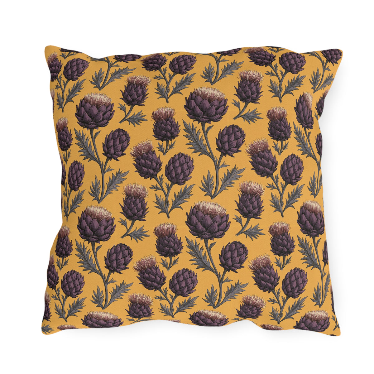 Deep plum artichoke thistles on warm ochre outdoor pillow
