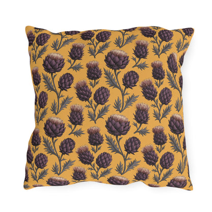 Deep plum artichoke thistles on warm ochre outdoor pillow