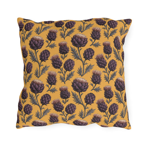 Deep plum artichoke thistles on warm ochre outdoor pillow