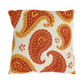 Boho outdoor pillow with large rust and mustard paisleys and small flowers on cream