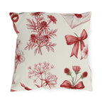 Red floral outdoor pillow with engraved toile wildflowers, ribbon bows and sealed love letters on cream