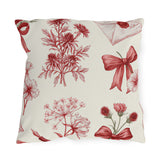 Red floral outdoor pillow with engraved toile wildflowers, ribbon bows and sealed love letters on cream