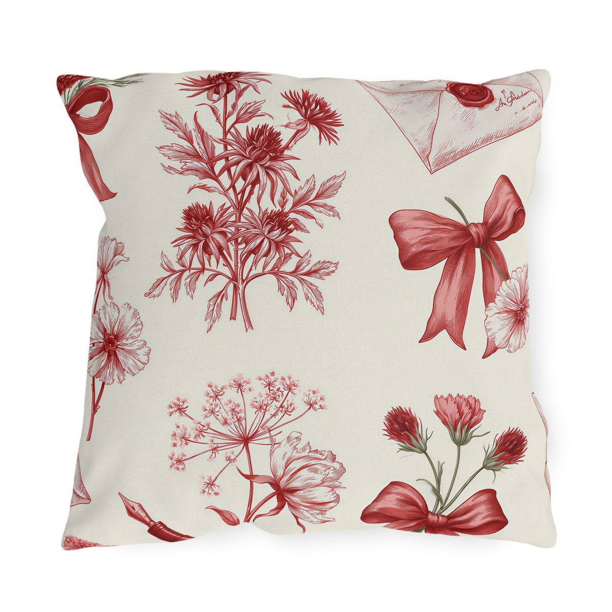 Red floral outdoor pillow with engraved toile wildflowers, ribbon bows and sealed love letters on cream