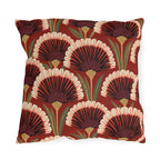 Modern outdoor pillow with art deco fan flowers in burgundy, cream and coral with green leaves on brick red